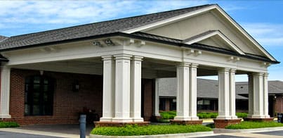 Chapman Healthcare & Assisted Living Center building front and porch
