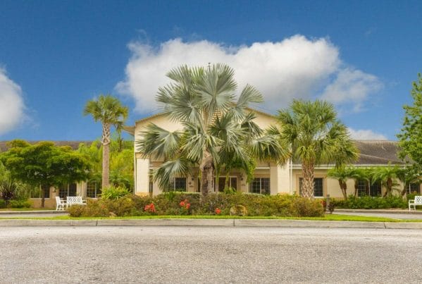 Palm trees in front of ProMedica Skilled Nursing and Rehabilitation Ft. Myers East
