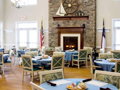 Arbor Landing at Ocean Isle community dining room and fireplace