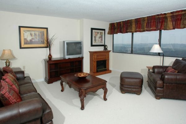 Mount Royal Towers model living room with fireplace