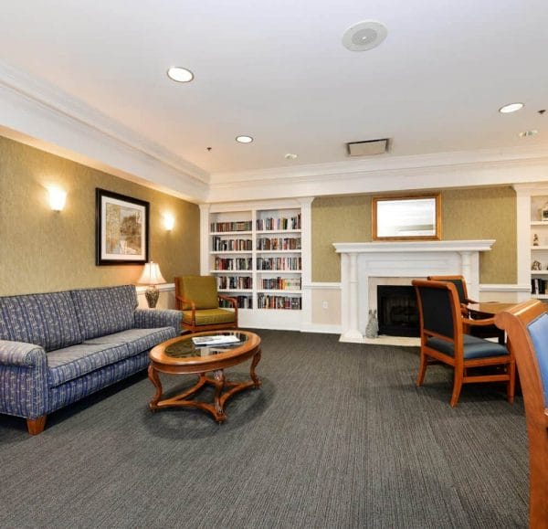 The Waterford at Virginia Beach community living room and fireplace