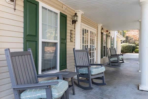 Hammond Place front porch with rocking chairs