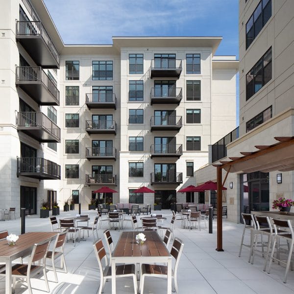 Courtyard and outdoor dining tables at St. Rita Square
