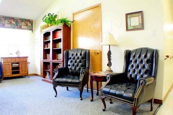 Leather arm chairs in the Berryhill Manor Retirement Center common area