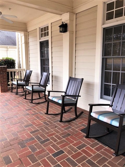 Front porch with rocking chairs at Keowee Place