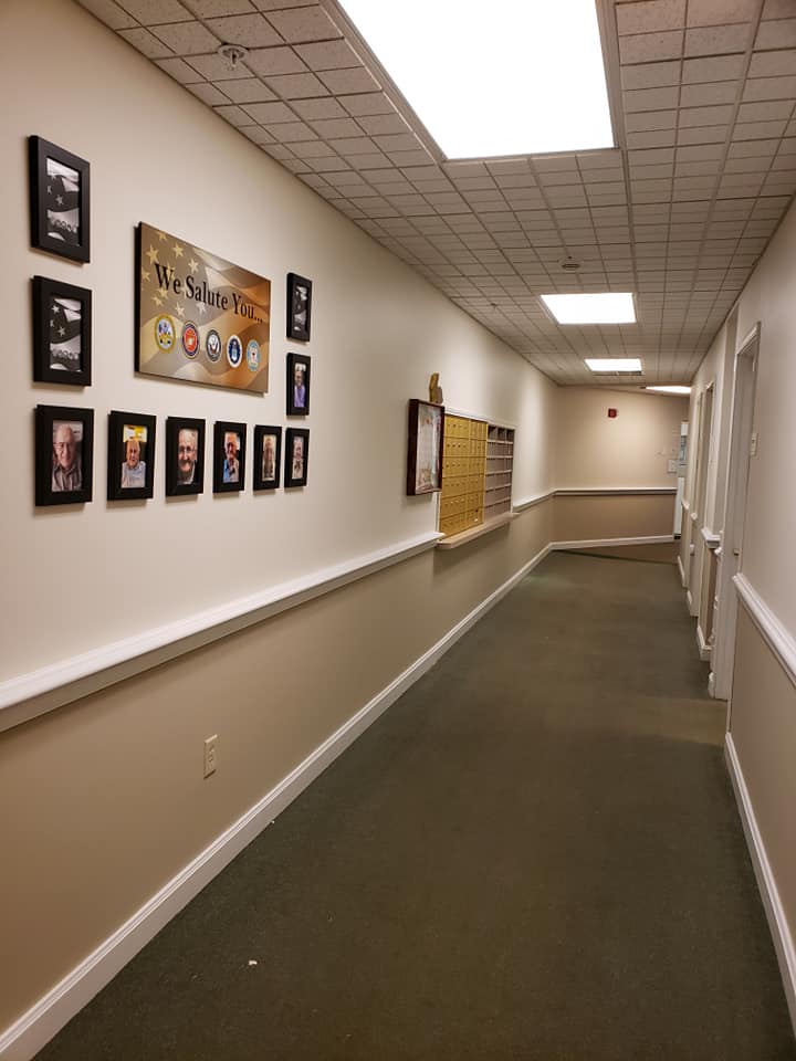 Smith Farms Manor indoor wall of honor and hallway