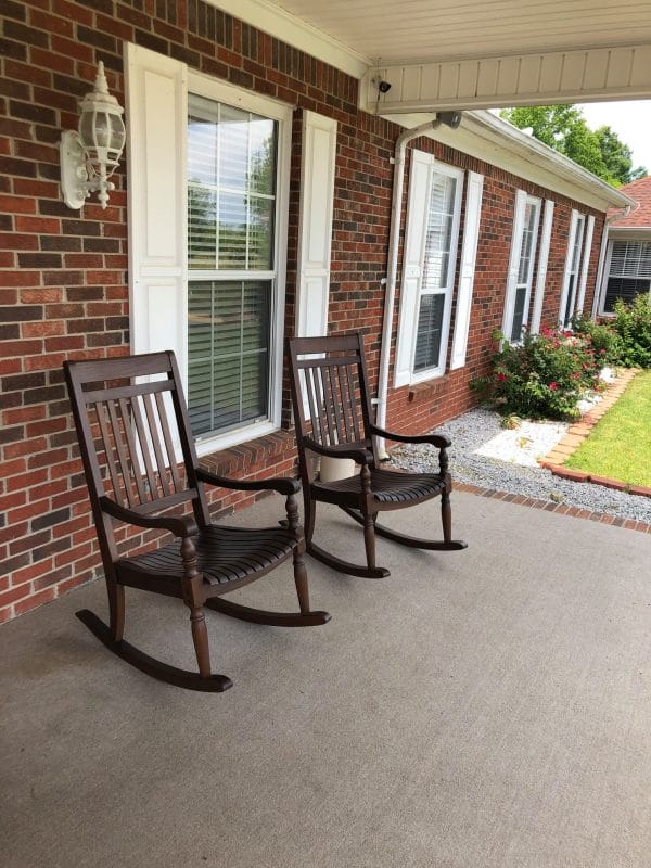 Rocking chairs on the front porch of Forest View Manor