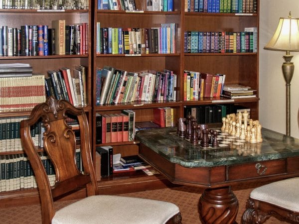 Rocky Ridge resident library with a chess table