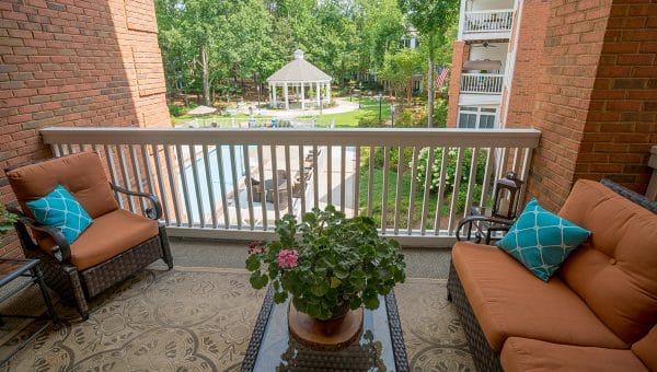Galleria Woods apartment balcony overlooking grounds and pool