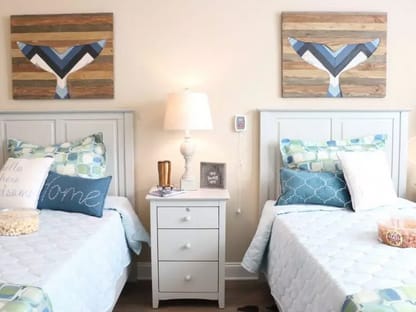 Two single beds in a Arbor Landing at Ocean Isle model home