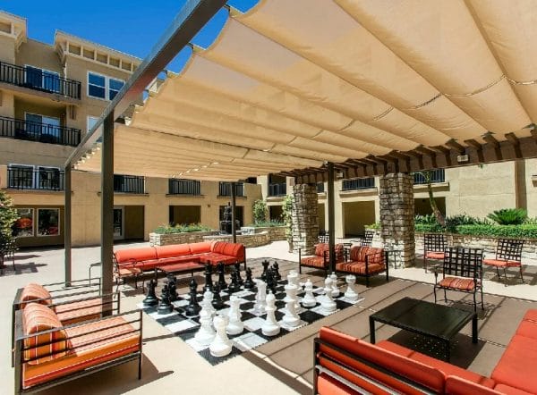 Outdoor Lawn Chess Board and Seating Area at FountainGlen at Pasadena