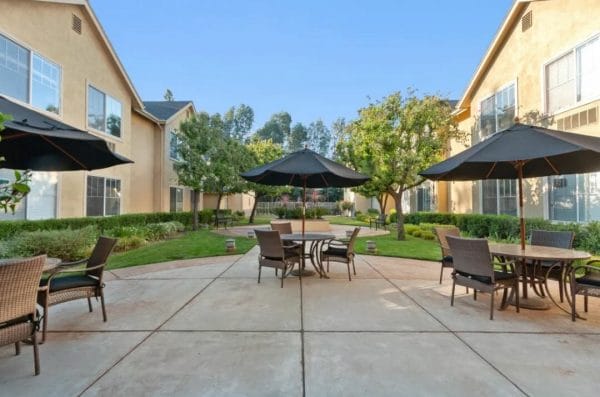 Outdoor Patio with Seating Area at Claremont Place