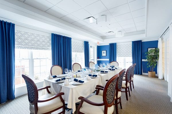 Abbotswood at Irving Park private dining room with navy blue drapes
