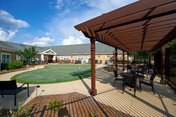 Putting green and outdoor trellis for residents of Redstone Village