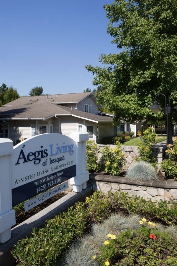 Building exterior and entrance sign to Aegis Living Issaquah