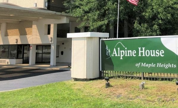 Alpine House of Maple Heights Sign and Entrance