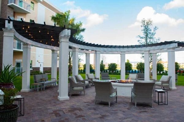 Trellis and fire pit outside of The Madyson at Palm Beach Gardens