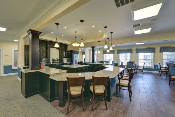 Large chefs kitchen with bar top seating in Benton House of Bluffton