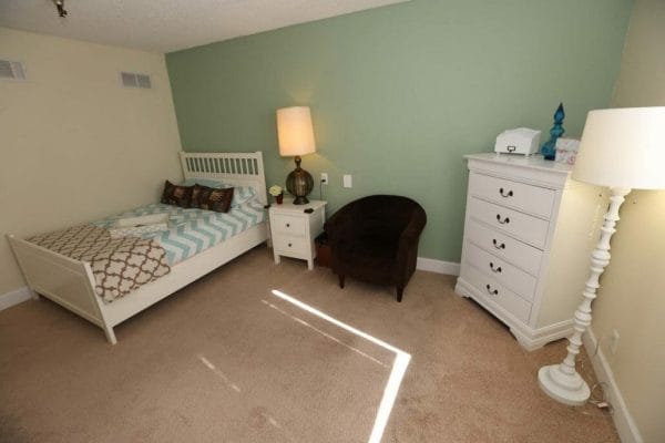 Bedroom in Model Apartment at Citrus Hills