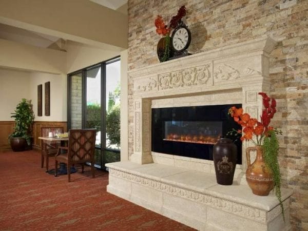 Fireplace in the main dining room at Pacifica Senior Living Escondido