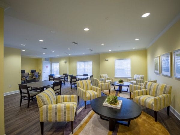 The clubhouse at Caroline Oaks with seating for residents