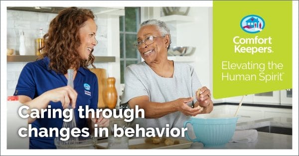 Comfort Keepers Caregiver cooking with senior woman