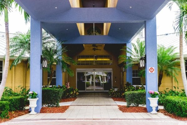 Covered walkway entrance to Barrington Terrace of Fort Myers