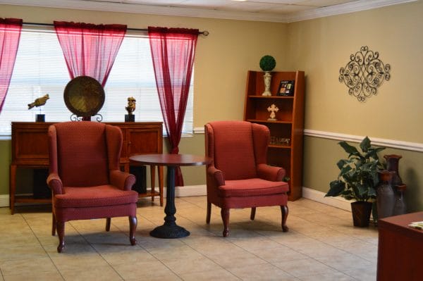New Port Richey Center for Assisted Living and Memory Care lobbyy with wing backed chairs