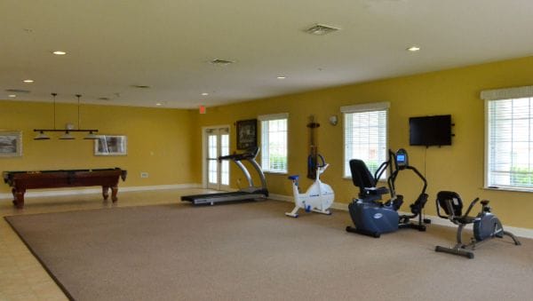 Fitness caenter with exercise equipment in The Terrace at Priceville