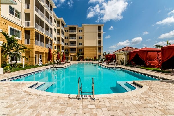 Swimming pool and residences at Discovery Village At The Forum - Independent Living