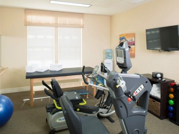 Exercise equipment in the Oakmont of Montecito fitness center
