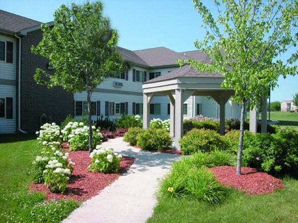 Outdoor gazebo and walking paths on the grounds of Miller's Merry Manor - Portage
