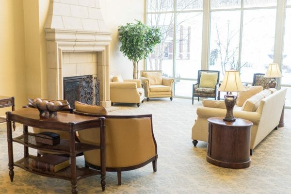 Paramount Senior Living at Bethel Park community living room and fireplace