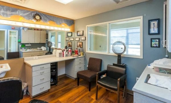Hair Salon with work station and hair dryer at Lassen House Senior Living