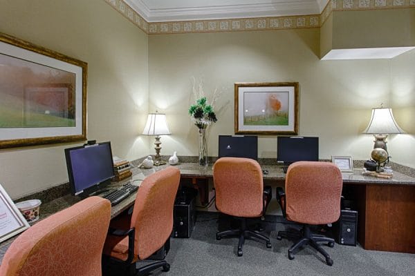 Office desks and computer staions in The Brennity at Melbourne community business center