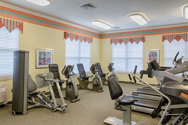 Fitness center filled with exercise equipment in The Brennity at Melbourne