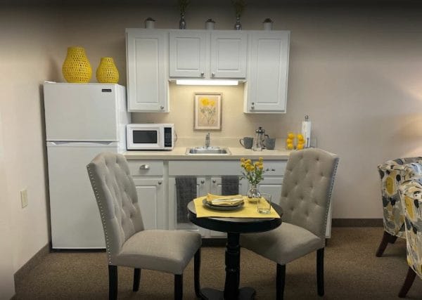 Model Home Yellow and light grey kitchenette at Regency Fallbrook