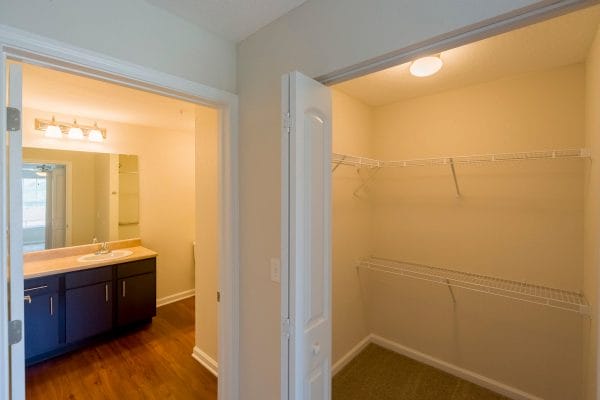 Large closet and spacious bathroom in a model at Mary Eaves Apartments