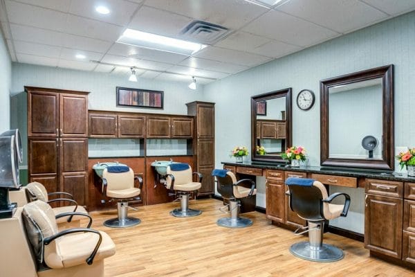 Salon stations in the Brandywine Living at Middlebrook Crossing beauty parlor and barber shop