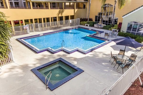Discovery Village At Boynton Beach outdoor swimming pool and hot tub