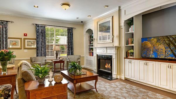 Morningside of Riverchase living room with cozy fireplace