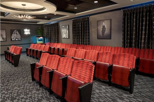 The Bristal Assisted Living at Garden City movie theater with fold down seats and dark drapes on the wall