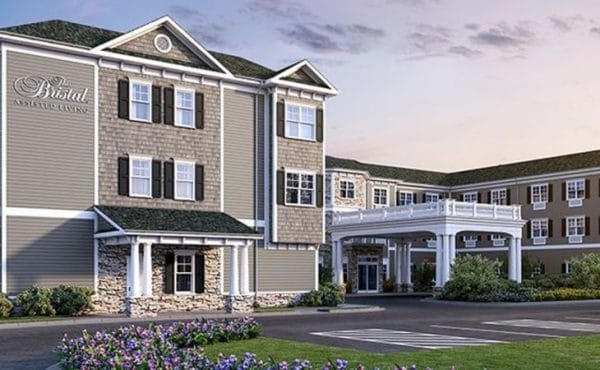 The Bristal Assisted Living at West Babylon front exterior view of building and covered driveway