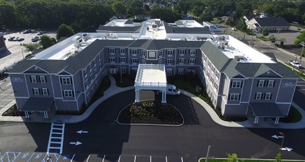 Aerial view of the front courtyard and entrance to The Bristal Assisted Living at West Babylon