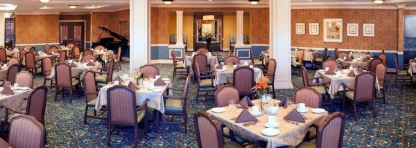 The Bristal Assisted Living at Woodcliff Lake dining room with many four top tables
