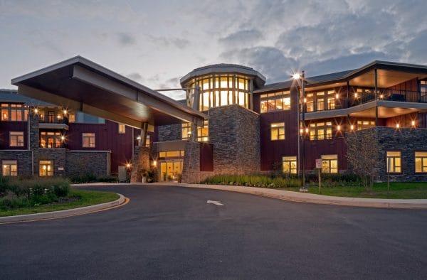 Exterior front view of The Summit in Hockessin, DE at night