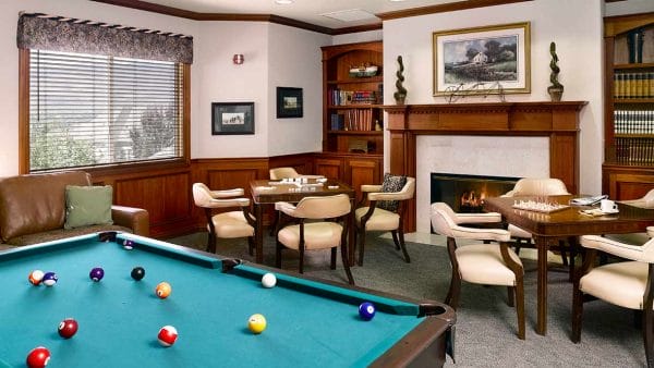 gameroom with pool table & other gaming tables