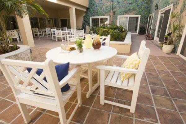 Outdoor dining table on the Brookdale Central Whittier patio