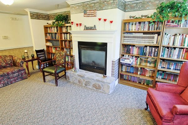 Fireside sitting area in the Brookdale Sevierville community library