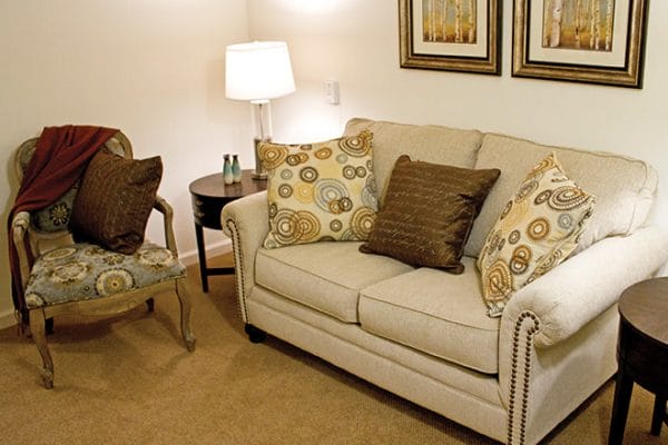 Model living room in a Brookdale Wilton residence